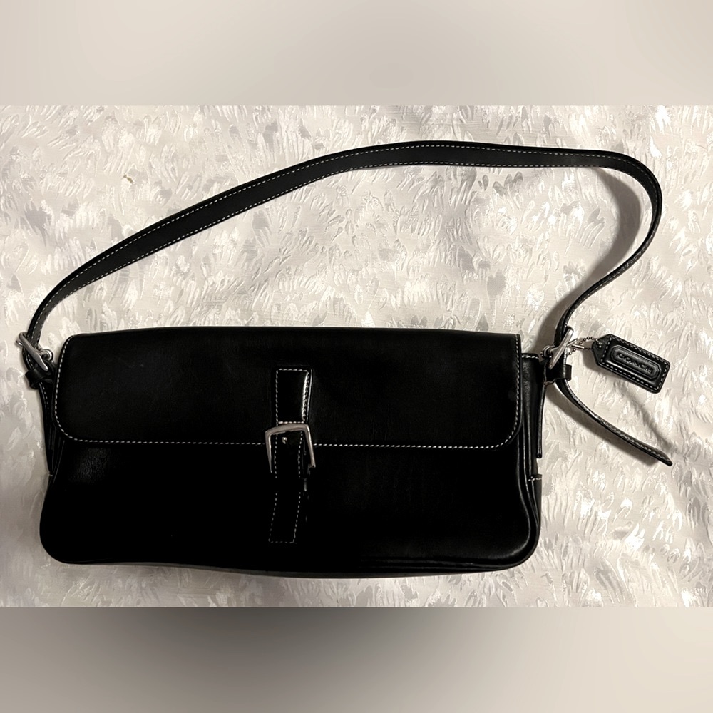 Coach vintage black leather shoulder purse. Holds a wallet and all the extras